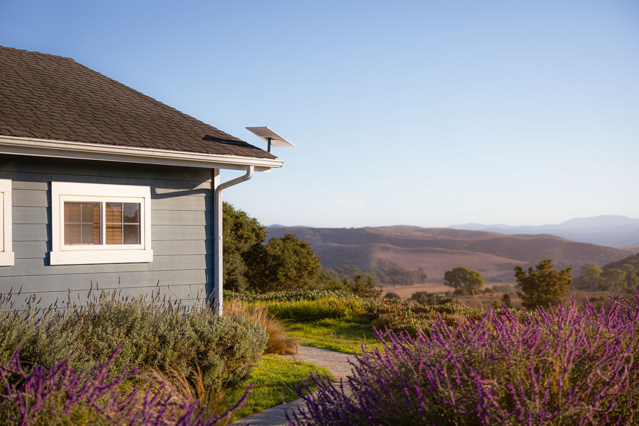 Starlink receiver installed on home roof.