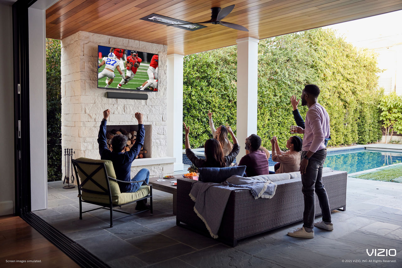 image of a group fo friends watching Sling TV on Vizio